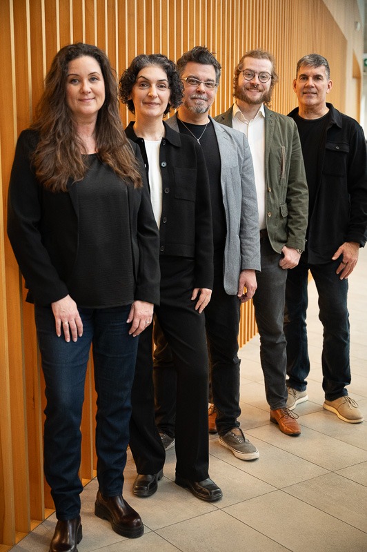 Software developers collaborating on mobile app development