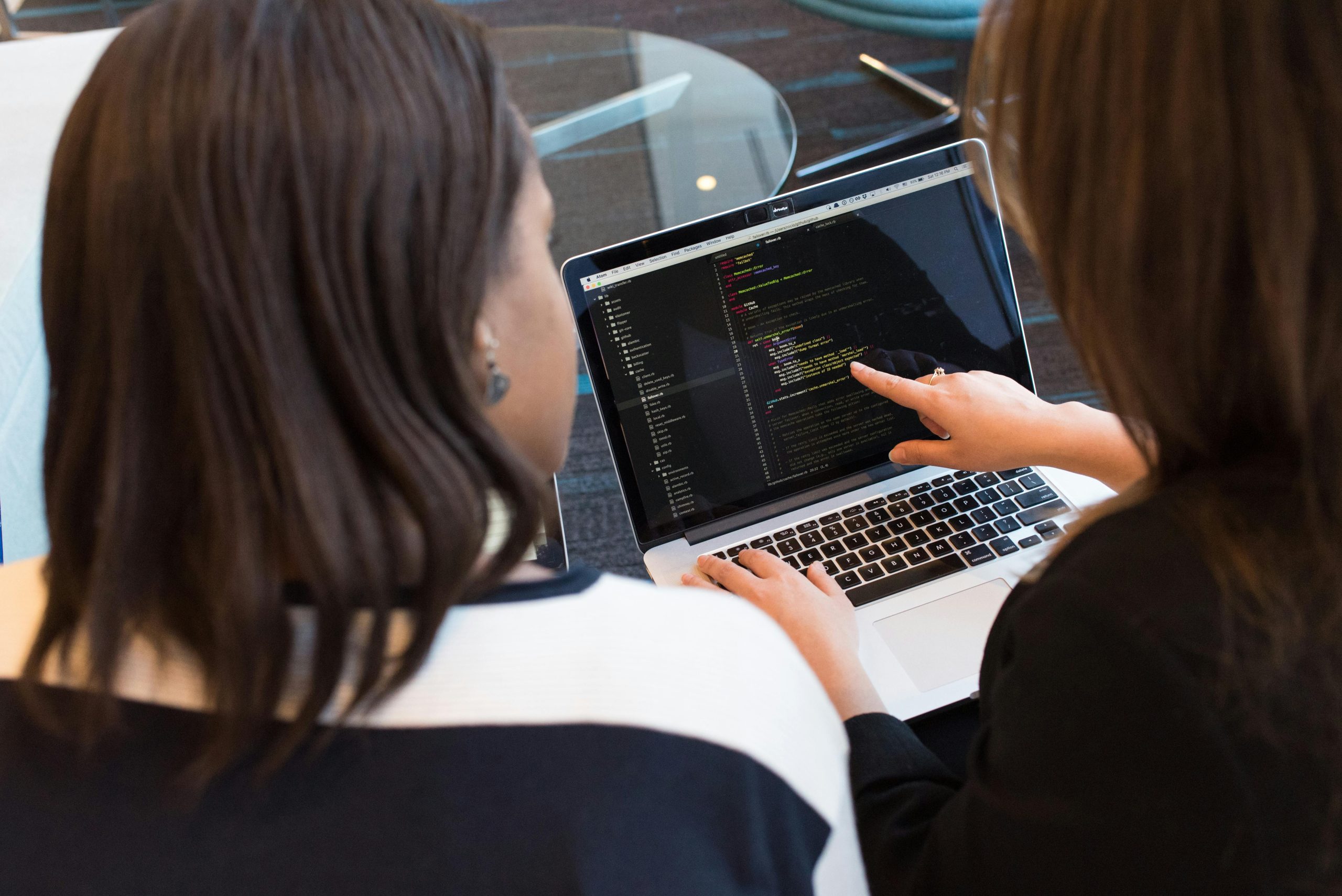Developer optimizing custom software performance metrics