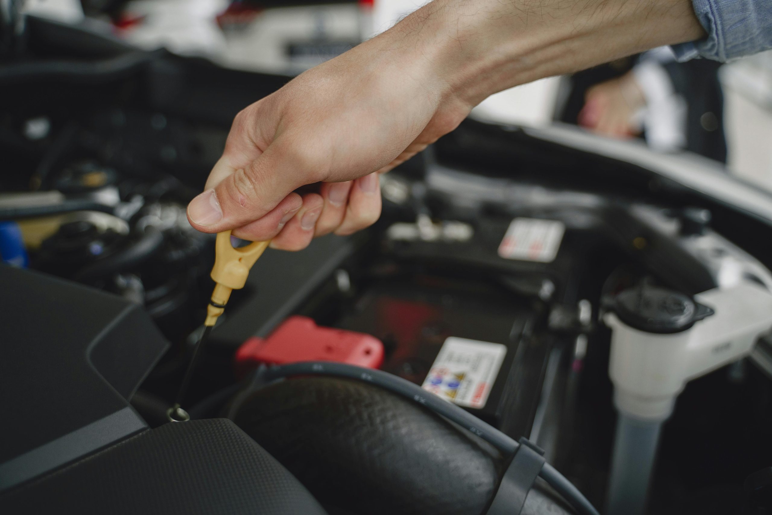Close-up of technician adjusting internal component symbolizing backend system optimization
